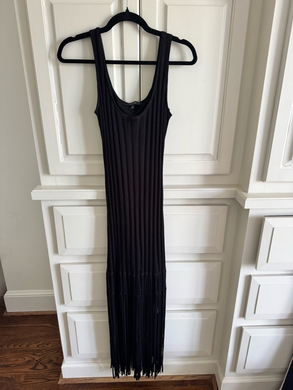 Sleeveless Black Ribbed Maxi Dress with Fringe Hem